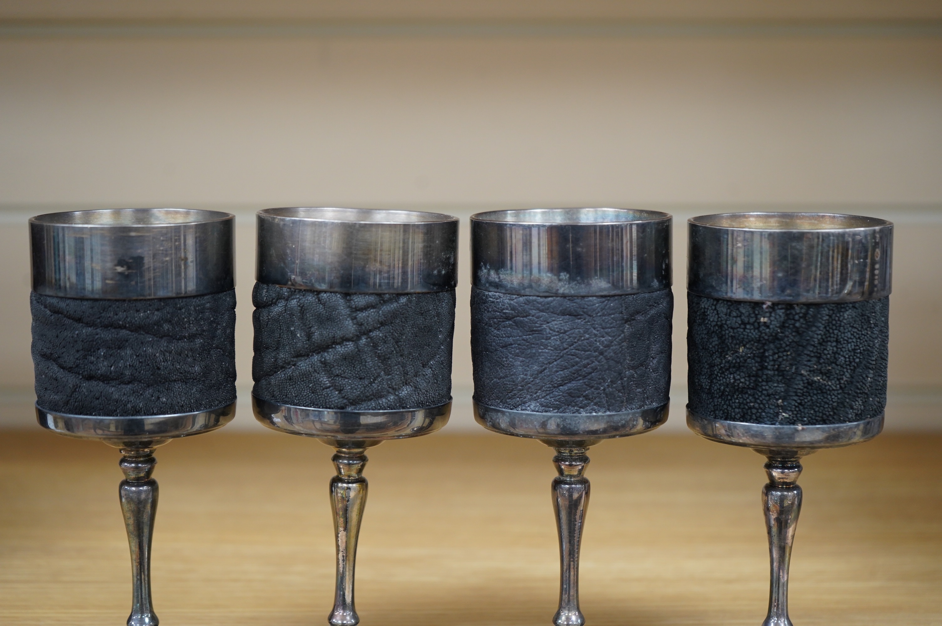 A set of four stylish animal hide and silver plate goblets, makers marks to base, 15.5cm. Condition - good